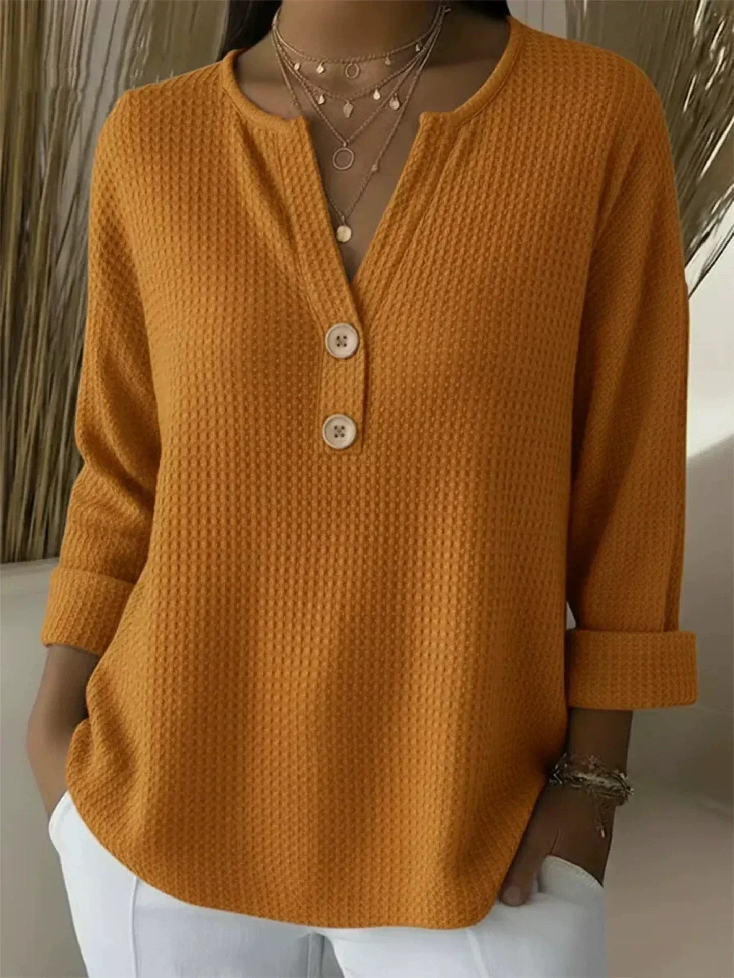 Puck henley-top met structuur en knopen