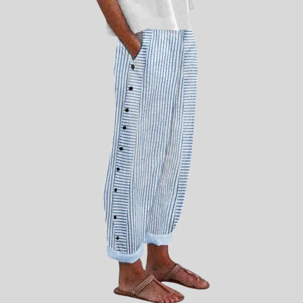 Elegante wijde damesbroek in neutrale kleur met elastische tailleband en soepel vallende pijpen