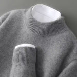Unisex kasjmier trui in grijs met opstaande col en geribde afwerking
