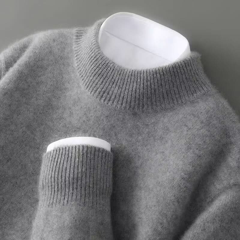 Unisex kasjmier trui in grijs met opstaande col en geribde afwerking