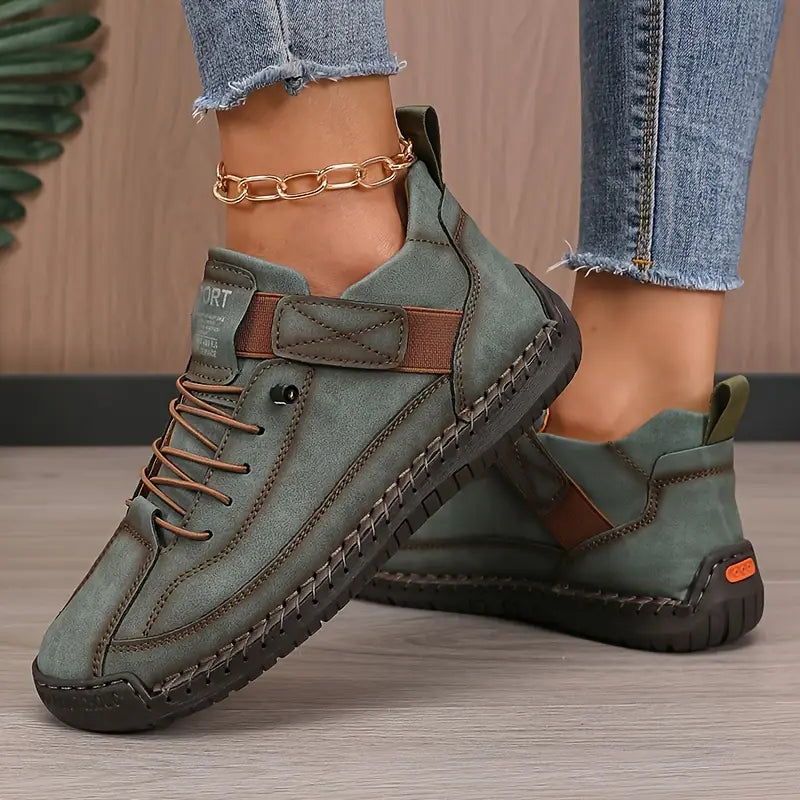 Orthopedische damessneakers van ademend leer met elastische zijpanelen en dikke EVA-zool