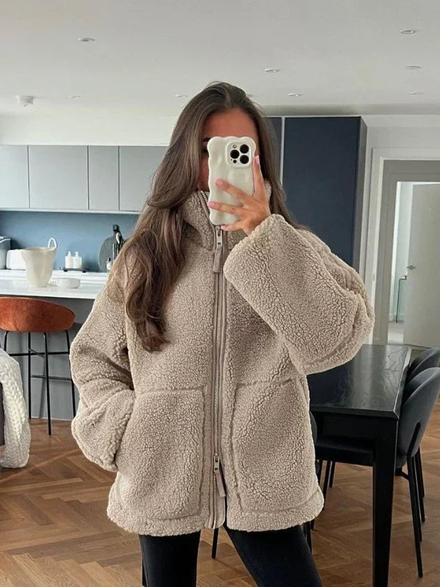 Zachte warme winterjas met capuchon, rits en ruime zakken in effen fleece voor dames