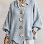 Bente oversized vest met goudkleurige knopen