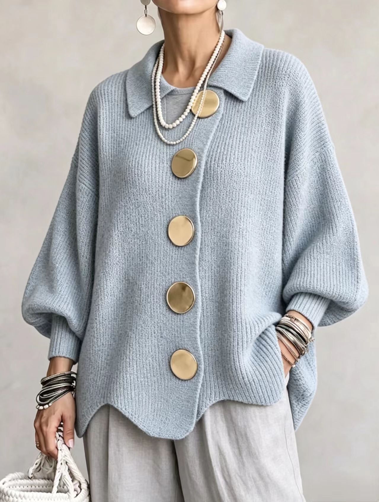 Bente oversized vest met goudkleurige knopen