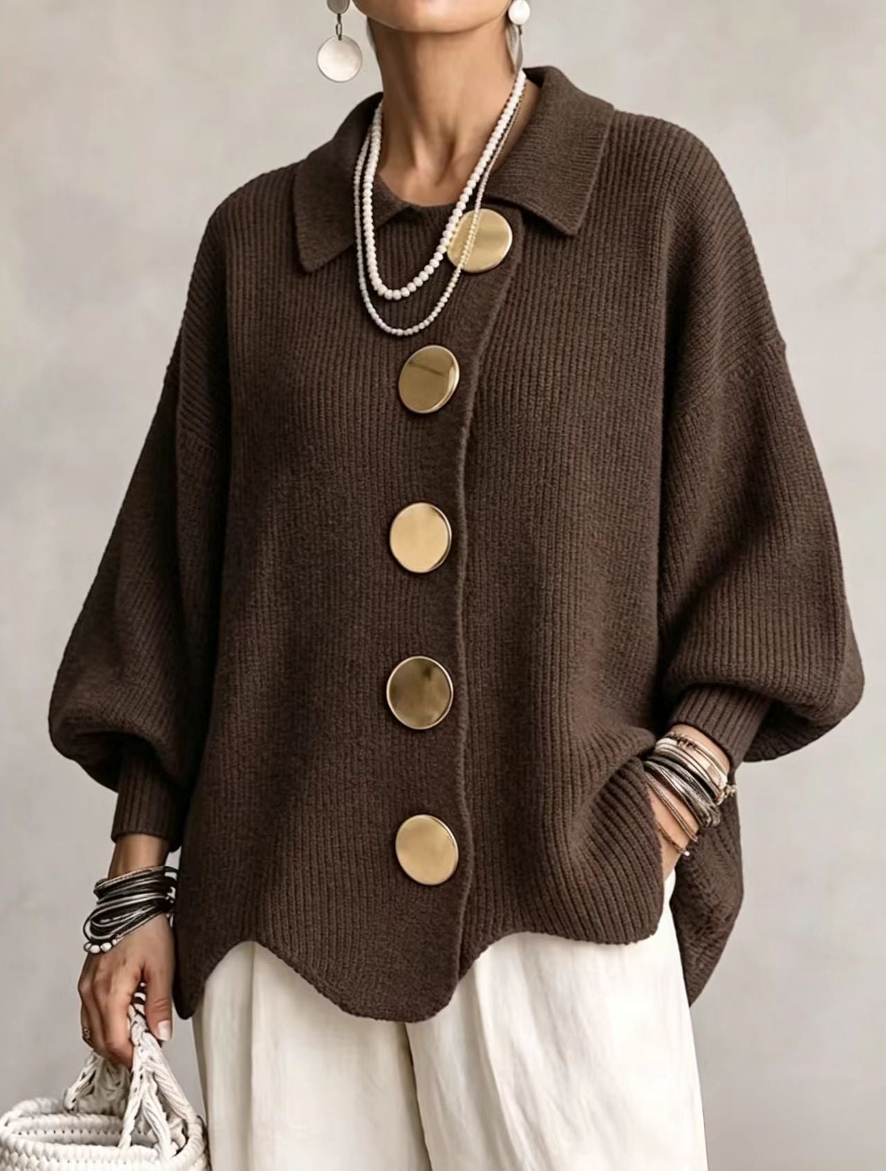 Bente oversized vest met goudkleurige knopen