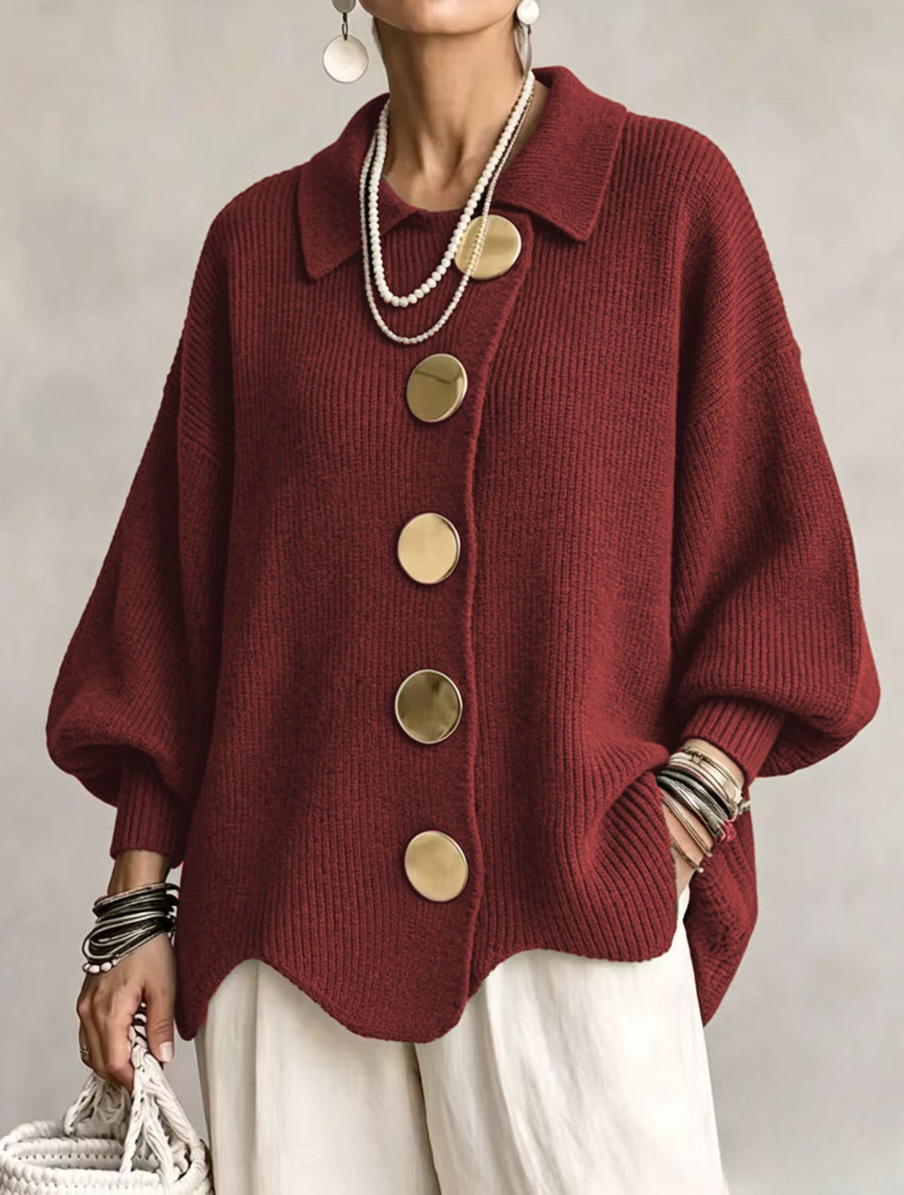 Bente oversized vest met goudkleurige knopen