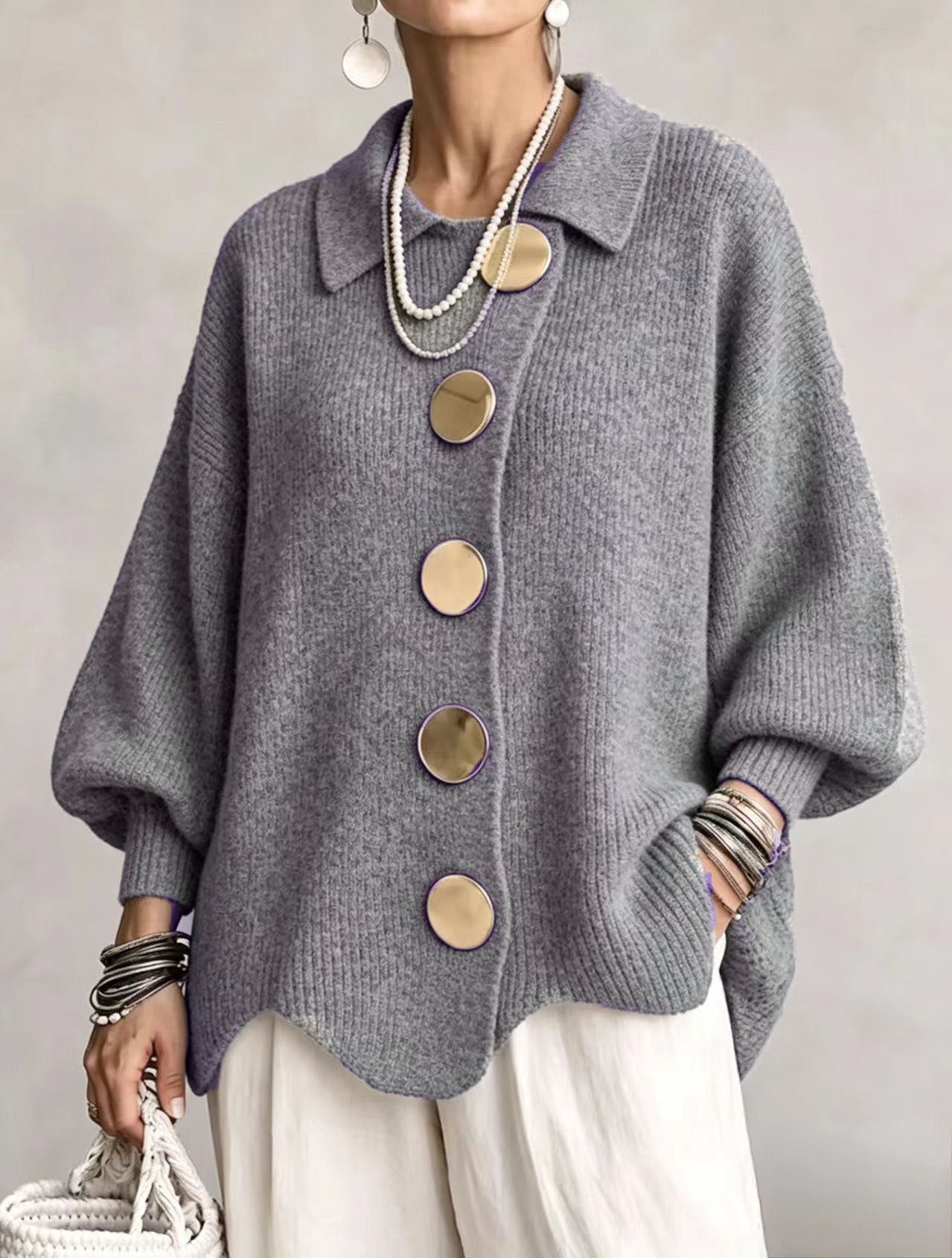 Bente oversized vest met goudkleurige knopen