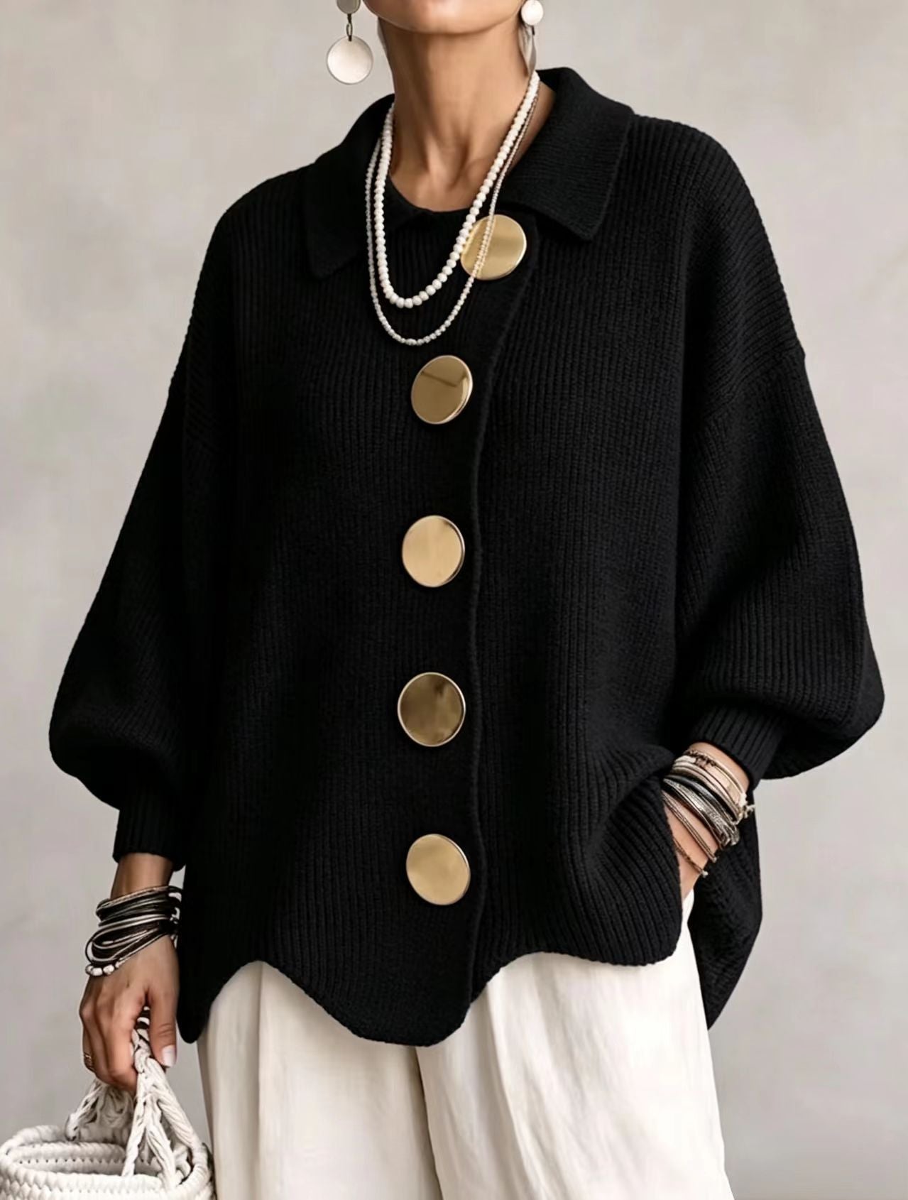 Bente oversized vest met goudkleurige knopen