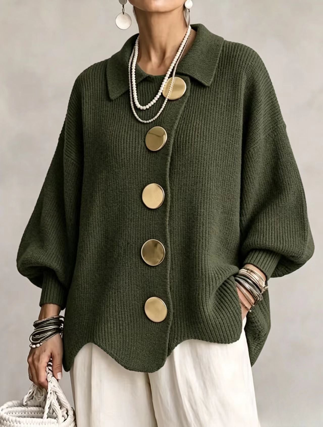 Bente oversized vest met goudkleurige knopen