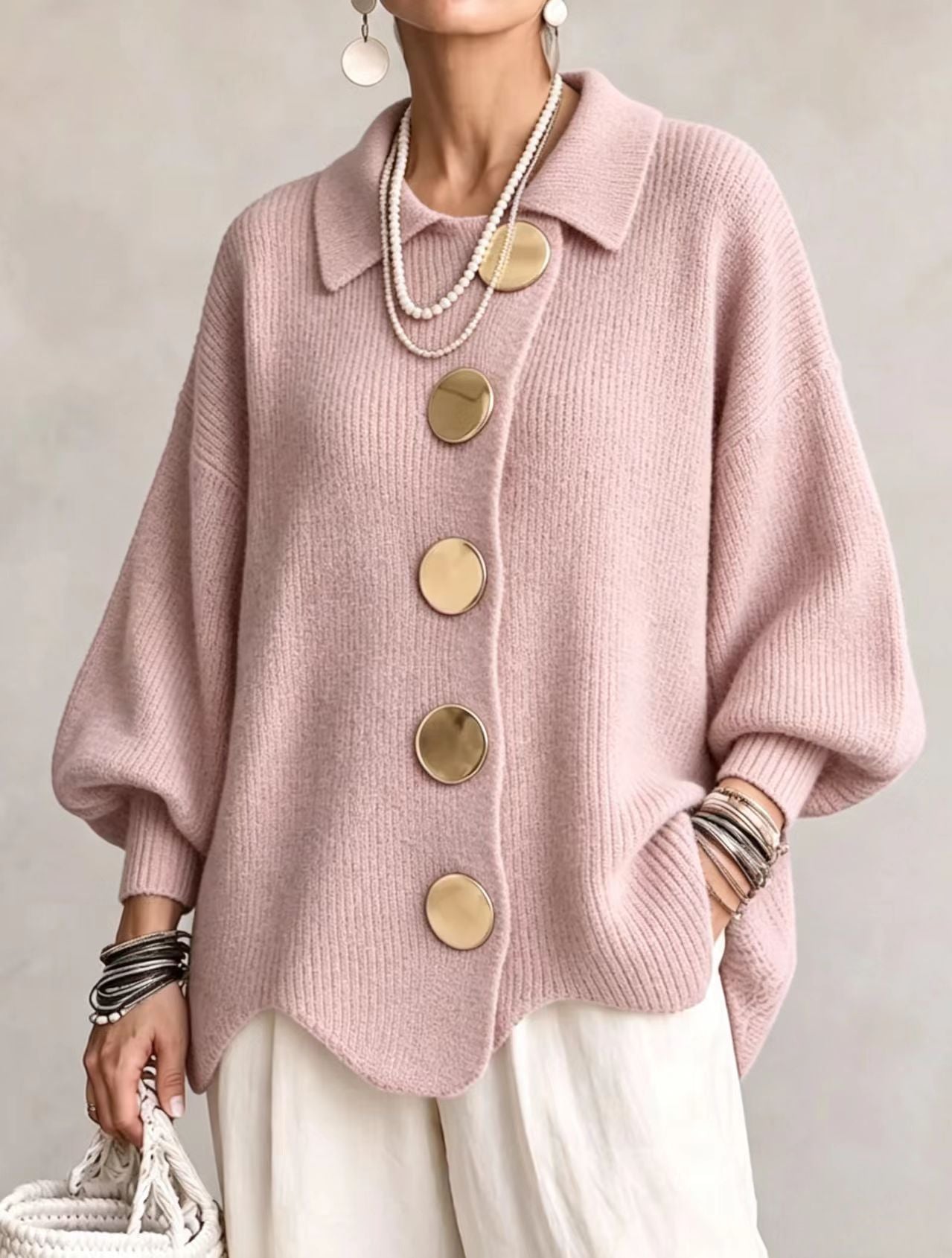 Bente oversized vest met goudkleurige knopen