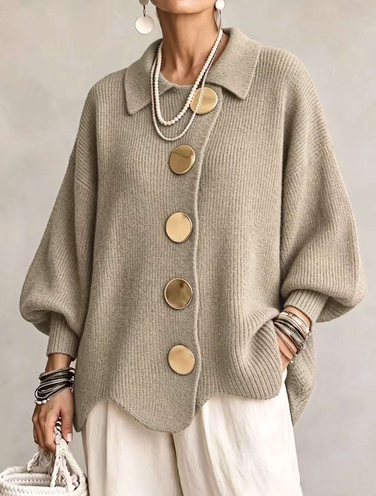 Bente oversized vest met goudkleurige knopen