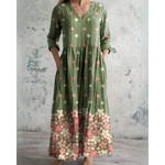 Lange maxi jurk met vintage bloemenprint in warme tinten, V-hals en taille
