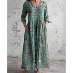 Lange maxi jurk met vintage bloemenprint in warme tinten, V-hals en taille
