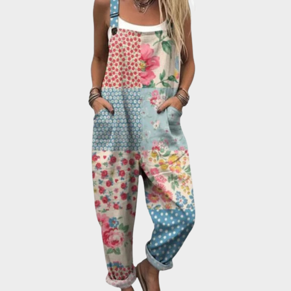 Comfortabele jumpsuit met vrolijke bloemenprint, wijde pijpen en verstelbare bandjes