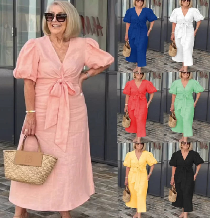 Elegante midi jurk voor dames met diepe V-hals, knoopdetail en pofmouwen