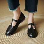 Retro dames schoenen met T-band, ronde neus en lage hak in effen afwerking