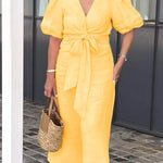 Elegante midi jurk voor dames met diepe V-hals, knoopdetail en pofmouwen