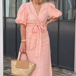 Elegante midi jurk voor dames met diepe V-hals, knoopdetail en pofmouwen