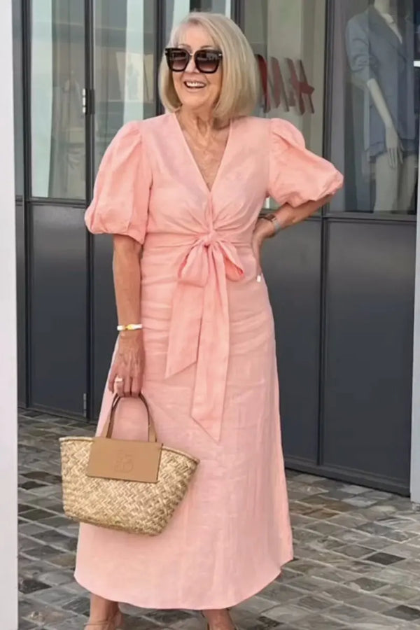 Elegante midi jurk voor dames met diepe V-hals, knoopdetail en pofmouwen