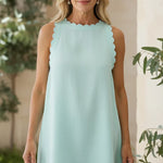 Elegante mini jurk voor dames met golvende zoom en mouwloos A-lijn model