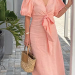 Elegante midi jurk voor dames met diepe V-hals, knoopdetail en pofmouwen