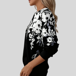 Renske dames sweater met bloemenprint en rits
