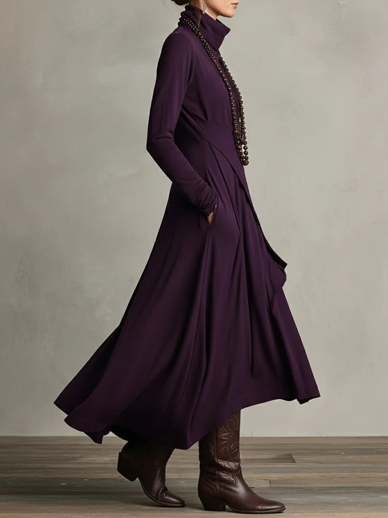 Elegante maxi jurk met zachte asymmetrische lagen en subtiele hoge halslijn