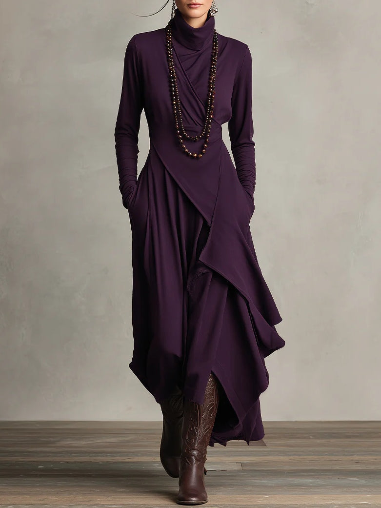 Elegante maxi jurk met zachte asymmetrische lagen en subtiele hoge halslijn