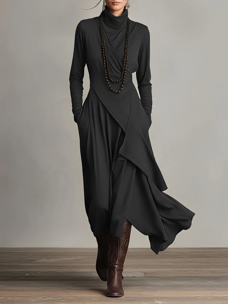 Elegante maxi jurk met zachte asymmetrische lagen en subtiele hoge halslijn