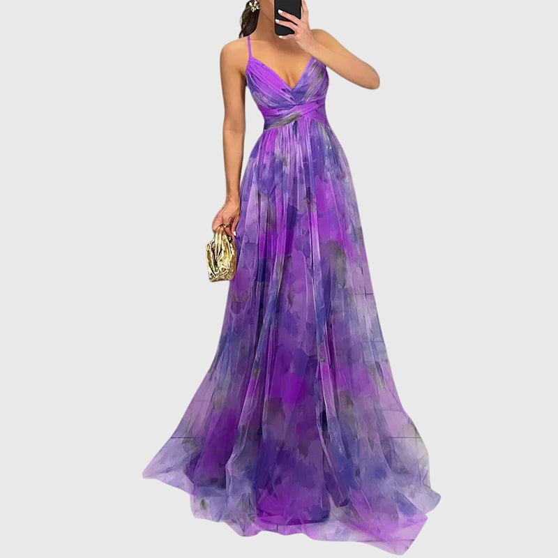 Lange maxi jurk met romantische bloemenprint, hoge taille en gekruiste bandjes