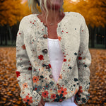 Gebreid vest met geborduurde bloemen voor dames, gedragen over een effen top en een jeans