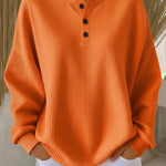 Corina dames sweater met structuur en henley-knoopsluiting