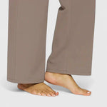 Elegante damesbroek in effen kleur met rechte pijpen, elastische tailleband en steekzakken