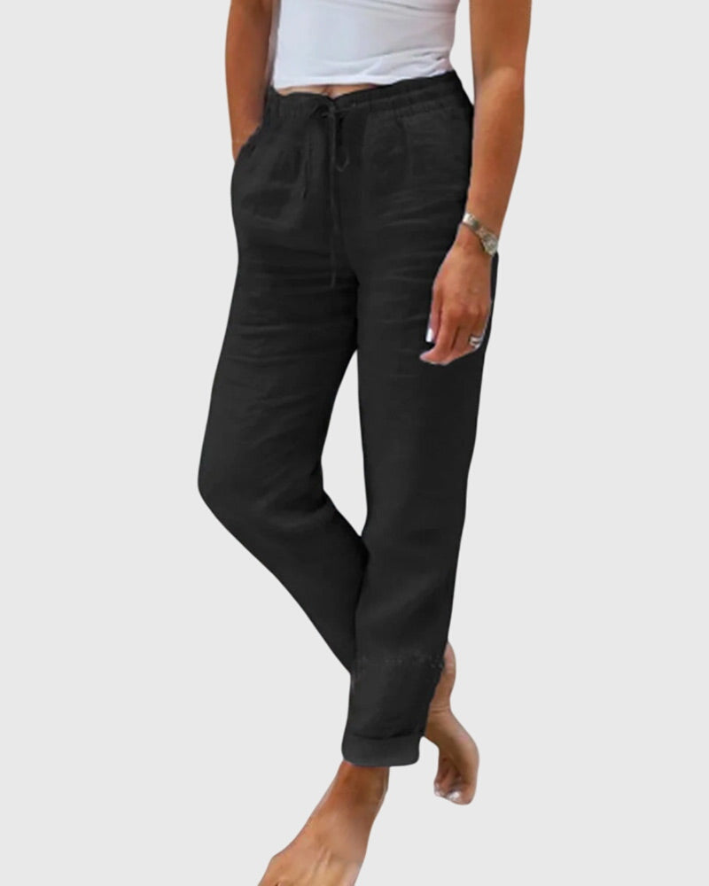 Elegante damesbroek in effen kleur met elastische tailleband en flatteuze, verzorgde snit
