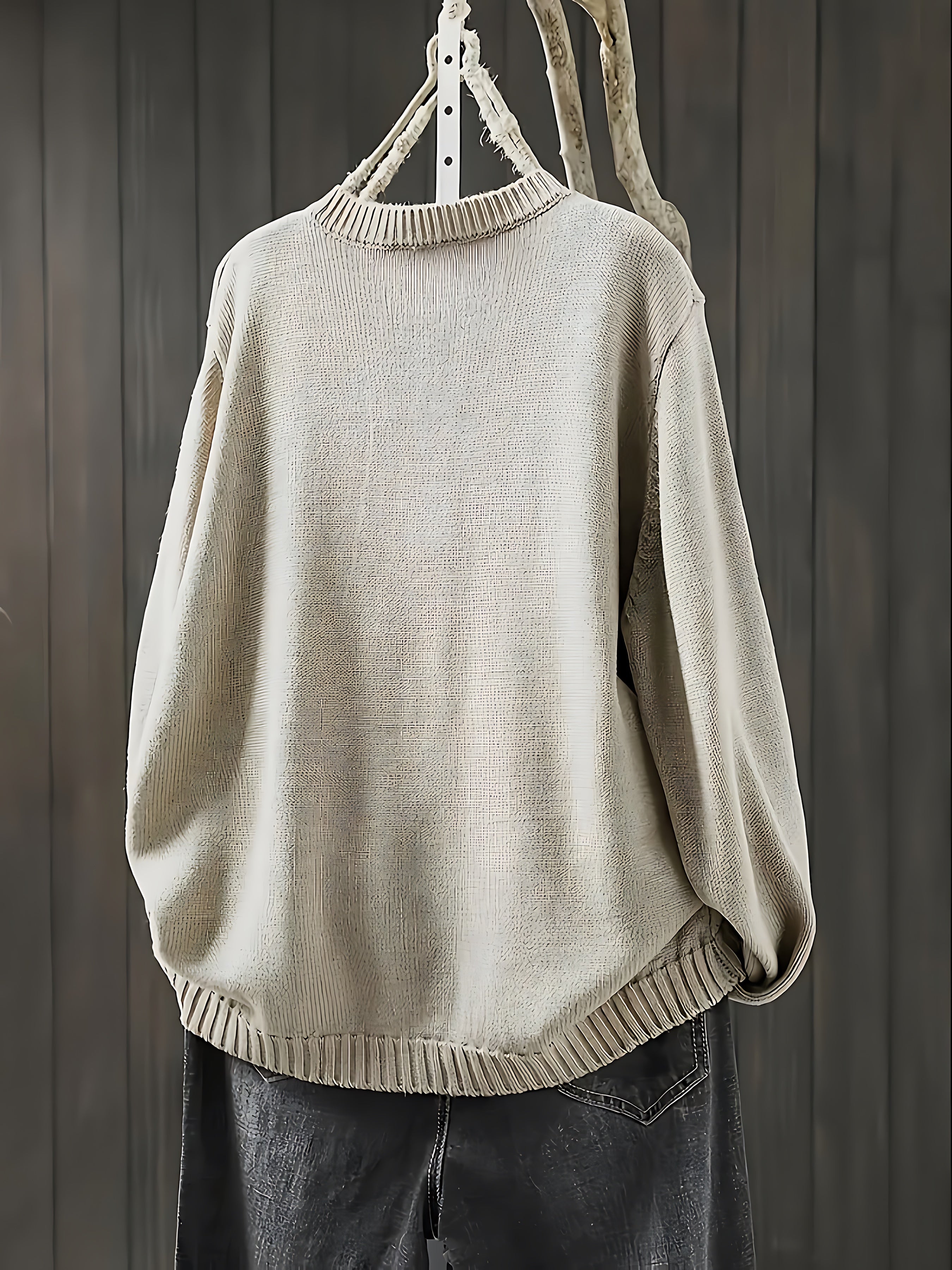 Gebreid vest met contrastknopen voor dames, gedragen over een effen top en een jeans