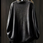 Gebreid vest met contrastknopen voor dames, gedragen over een effen top en een jeans