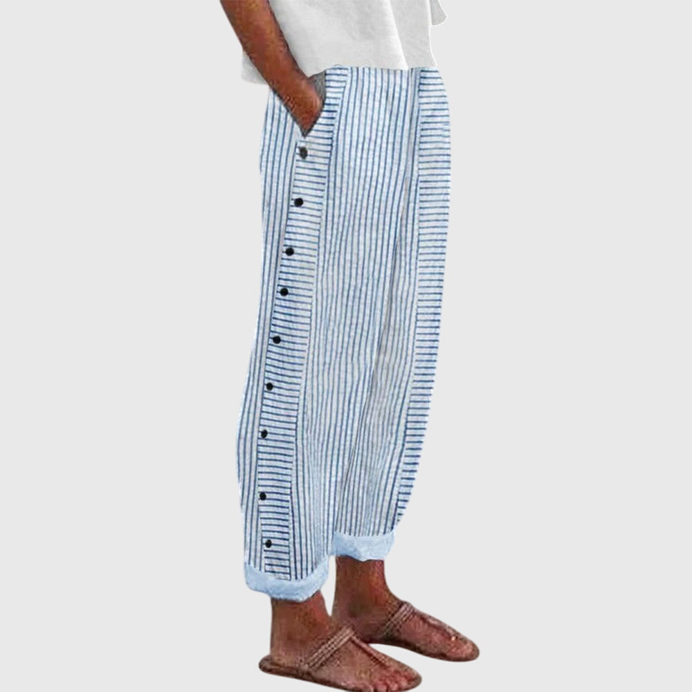 Elegante wijde damesbroek in neutrale kleur met elastische tailleband en soepel vallende pijpen