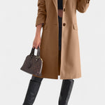 Saskia dames getailleerde halflange jas