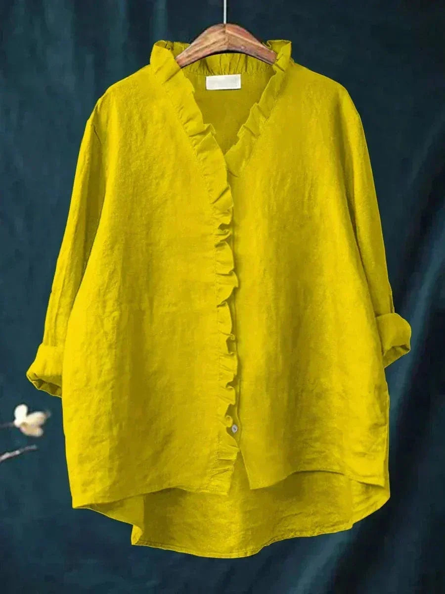 Lichte dames zomerblouse met verfijnd dessin en lange mouwen in ademende stof
