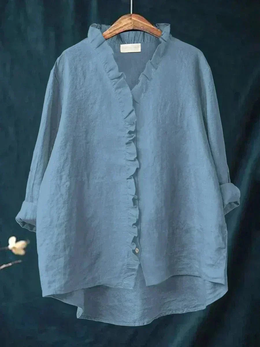 Lichte dames zomerblouse met verfijnd dessin en lange mouwen in ademende stof