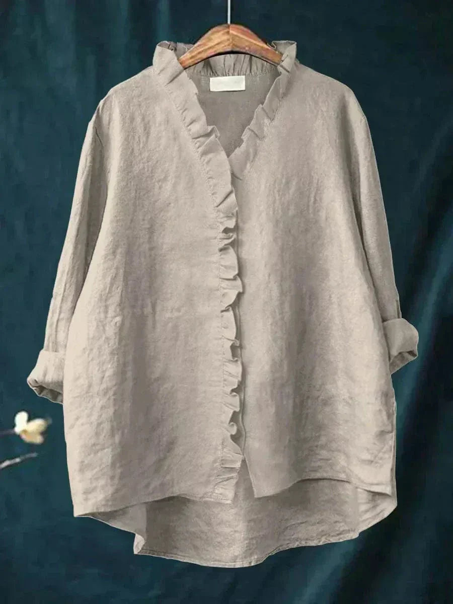 Lichte dames zomerblouse met verfijnd dessin en lange mouwen in ademende stof