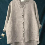 Lichte dames zomerblouse met verfijnd dessin en lange mouwen in ademende stof