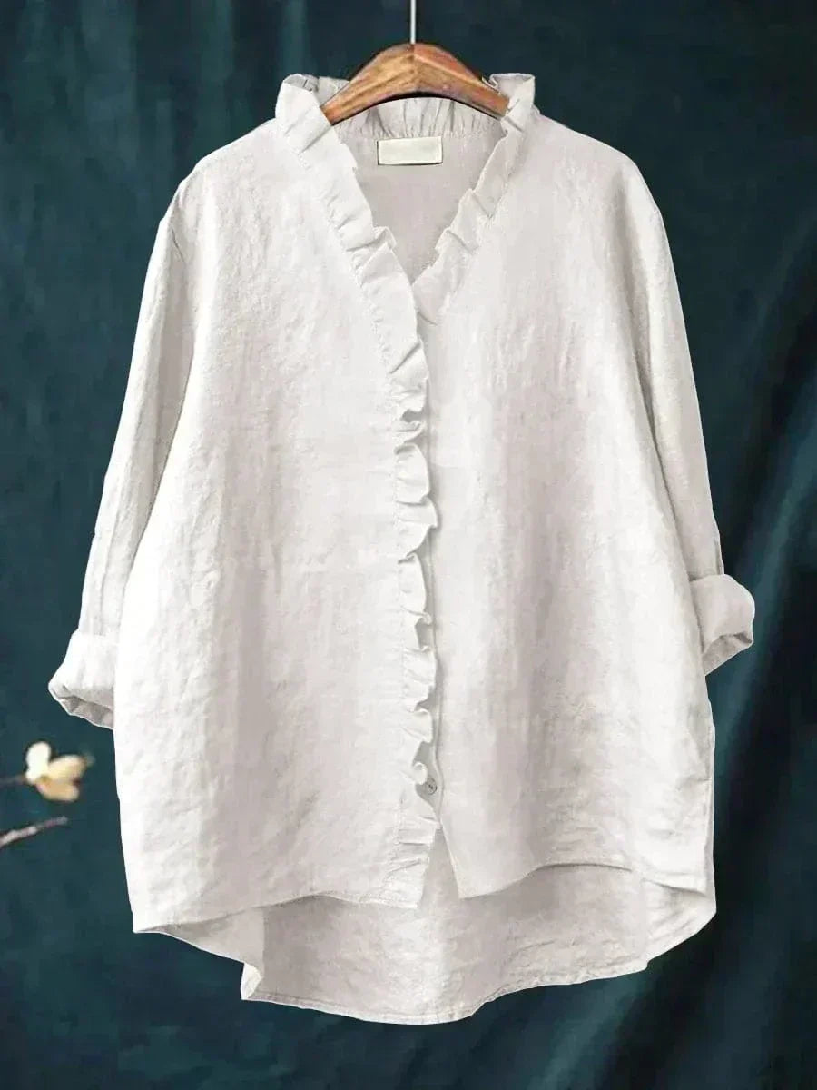 Lichte dames zomerblouse met verfijnd dessin en lange mouwen in ademende stof