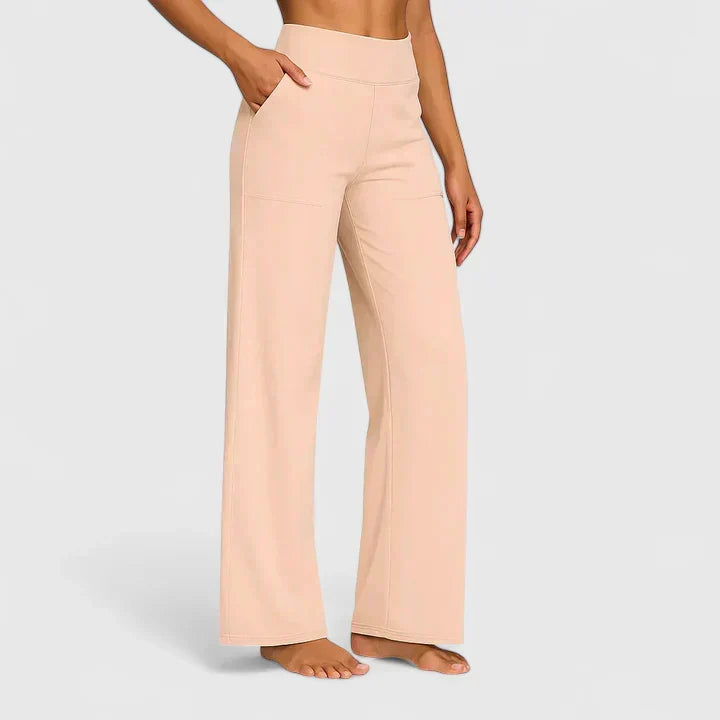 Elegante damesbroek in effen kleur met rechte pijpen, elastische tailleband en steekzakken