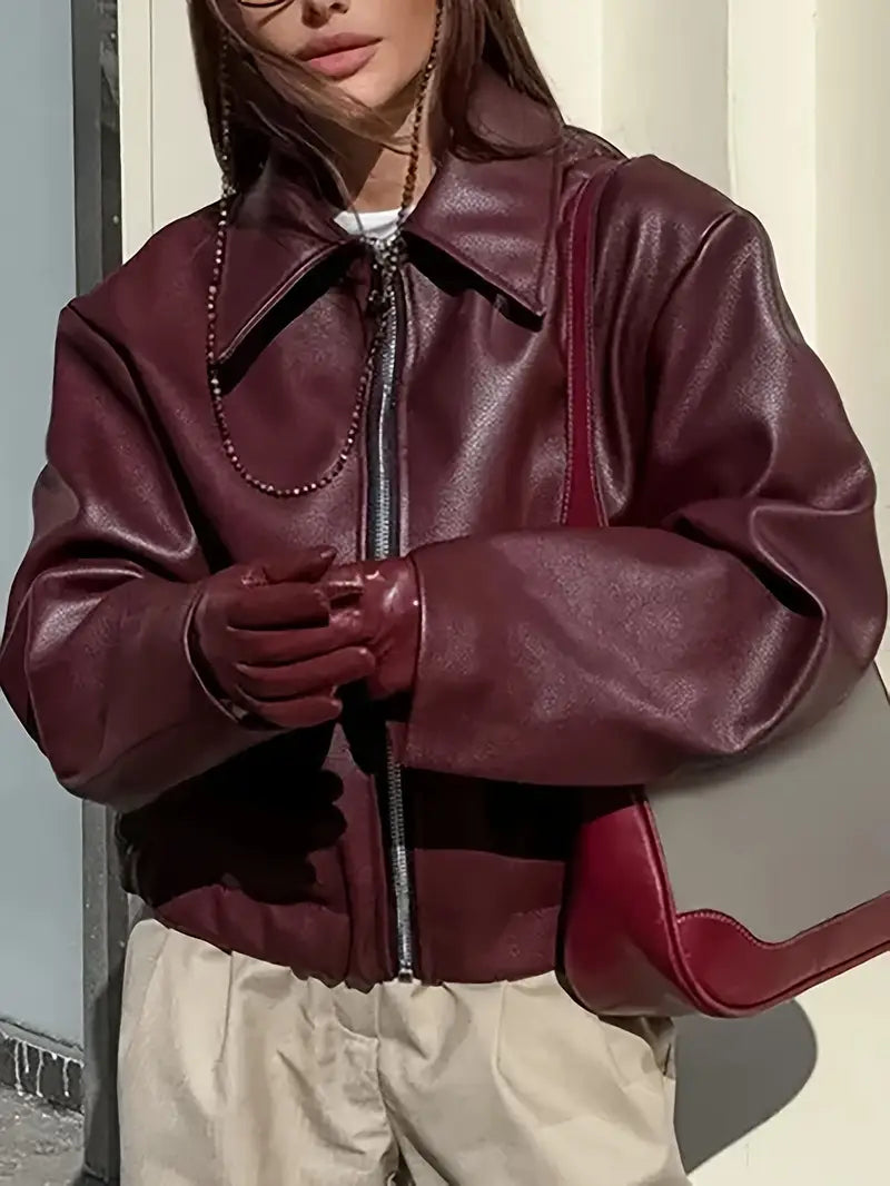 Oversized kort dames jack van nepleer met ruime schouderlijn