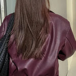 Oversized kort dames jack van nepleer met ruime schouderlijn