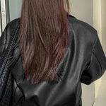 Oversized kort dames jack van nepleer met ruime schouderlijn