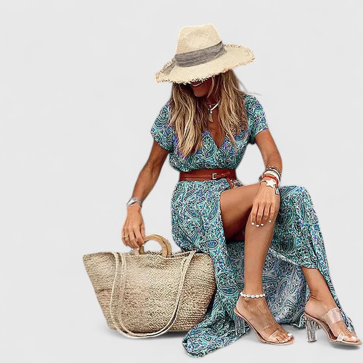 Lange elegante boho maxi jurk met zomerse print en gerimpelde elastische taille
